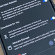 Photo of a phone with auto-download settings on